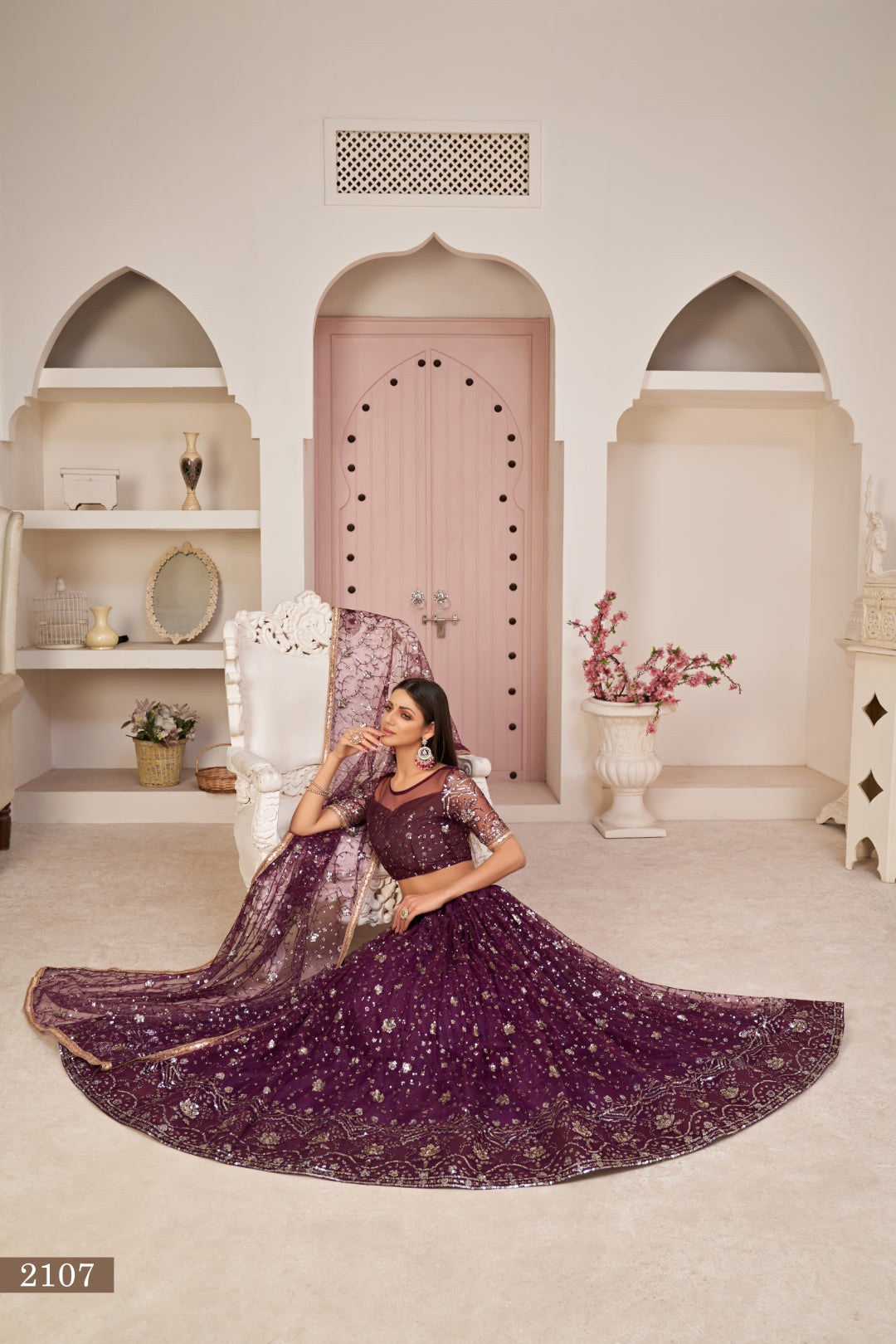 Wine Luxurious Butterfly Net Lehenga with All-Over Embroidery