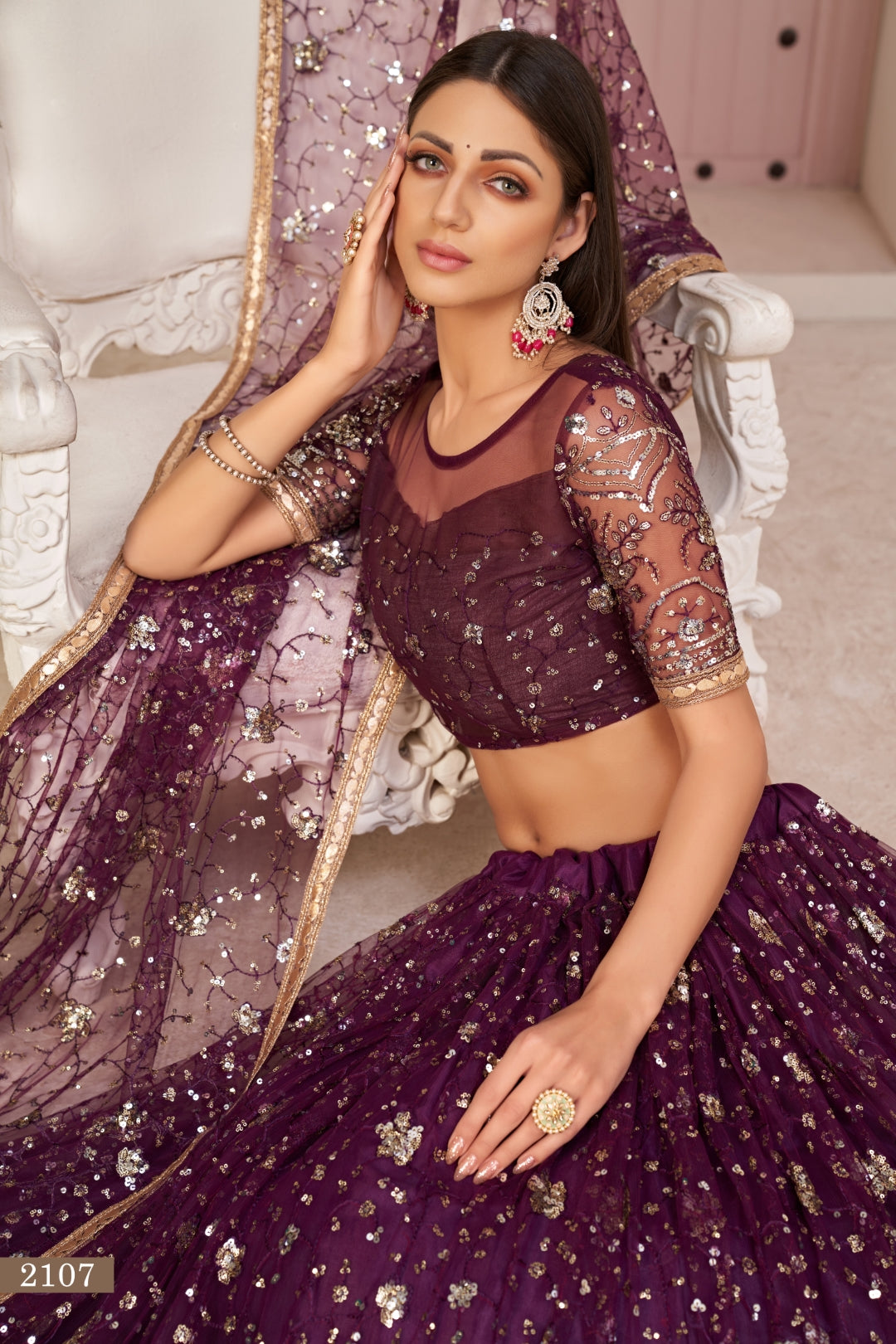 Wine Luxurious Butterfly Net Lehenga with All-Over Embroidery