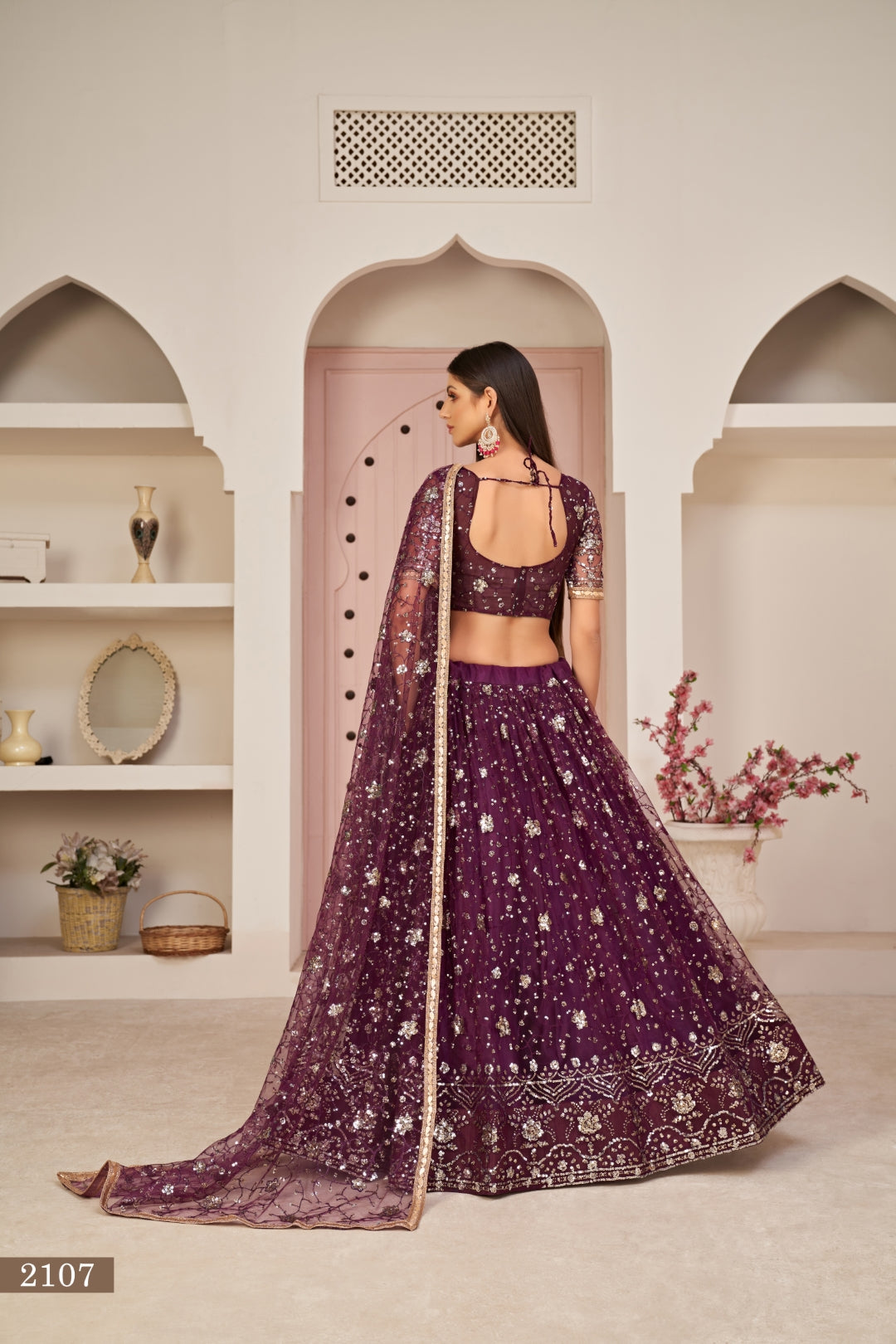 Wine Luxurious Butterfly Net Lehenga with All-Over Embroidery