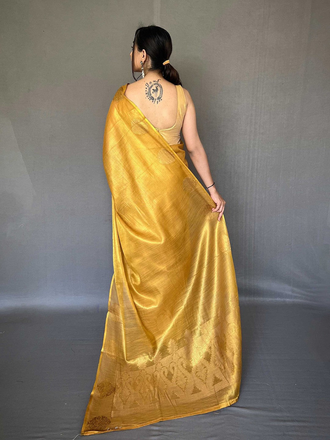 Yellow Elegant Woven Tissue Silk Saree with Gold Accents Party & Festive Wear