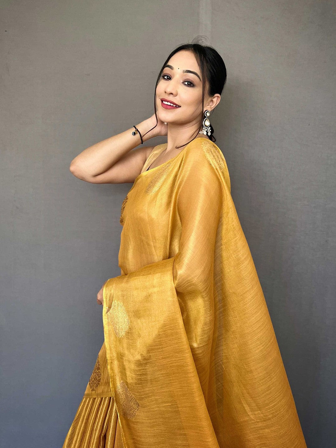 Yellow Elegant Woven Tissue Silk Saree with Gold Accents Party & Festive Wear